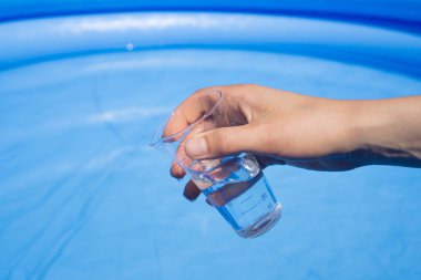 testing water chemistry in swimming pool